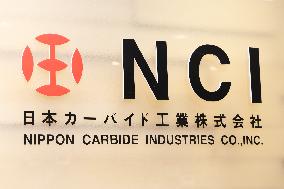 Nippon Carbide Industries signboard and logo